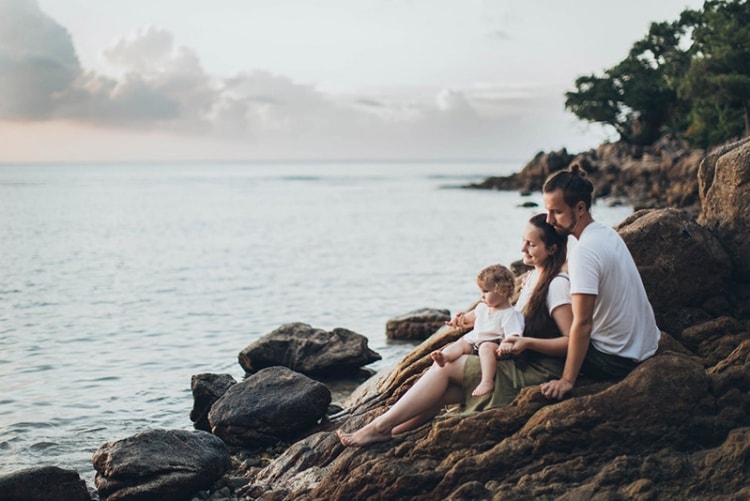family enjoying their free time at the beach